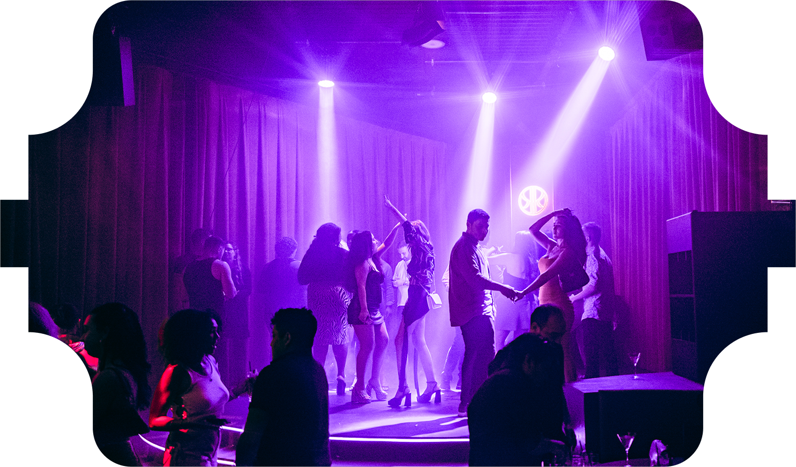 Guests dancing beneath the red lanterns