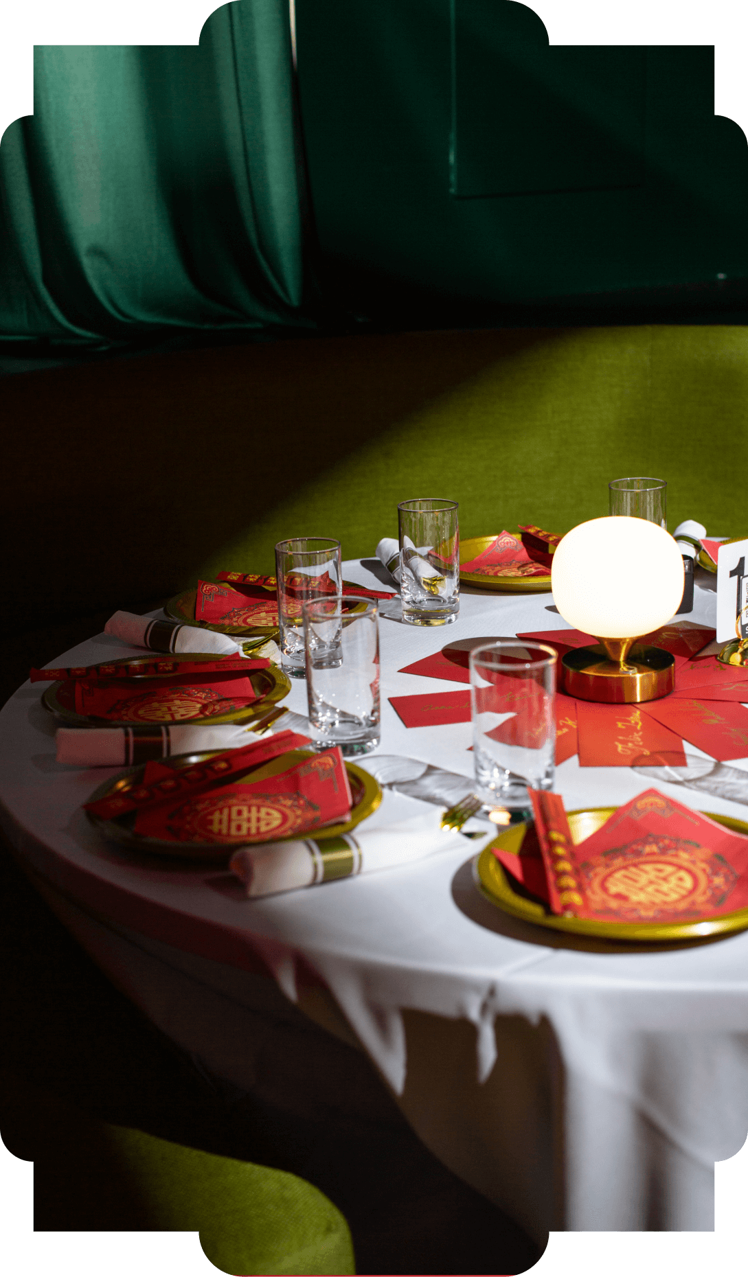 A table set with red tableware for a private event at The Red Pavilion